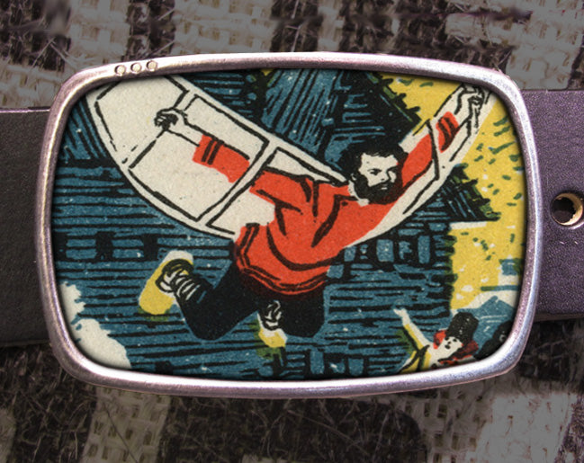 a picture of a man holding a surfboard on a belt