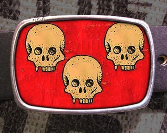 a belt with two skulls painted on it